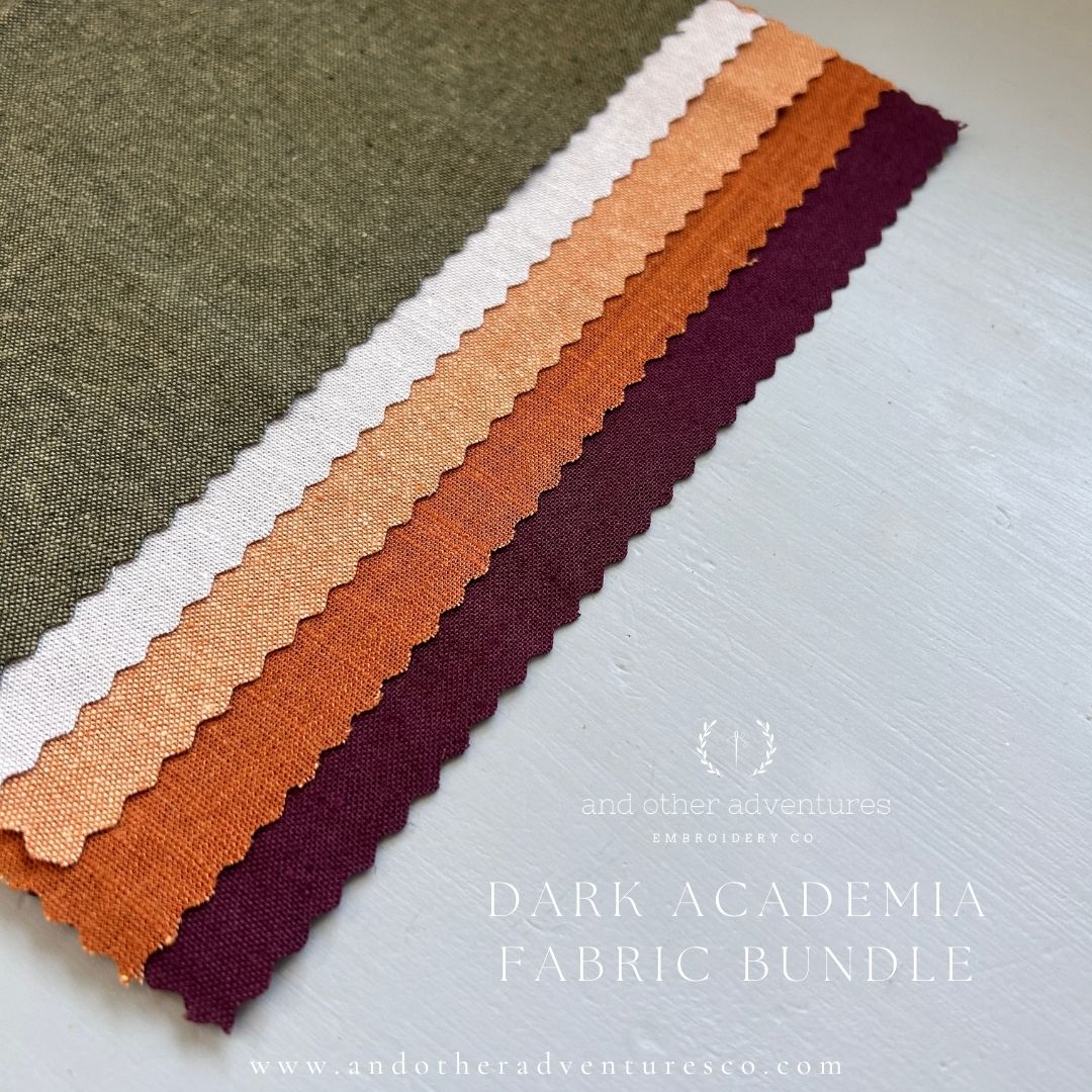 Fabric swatches in various dark academia colors arranged in a row on a light background.