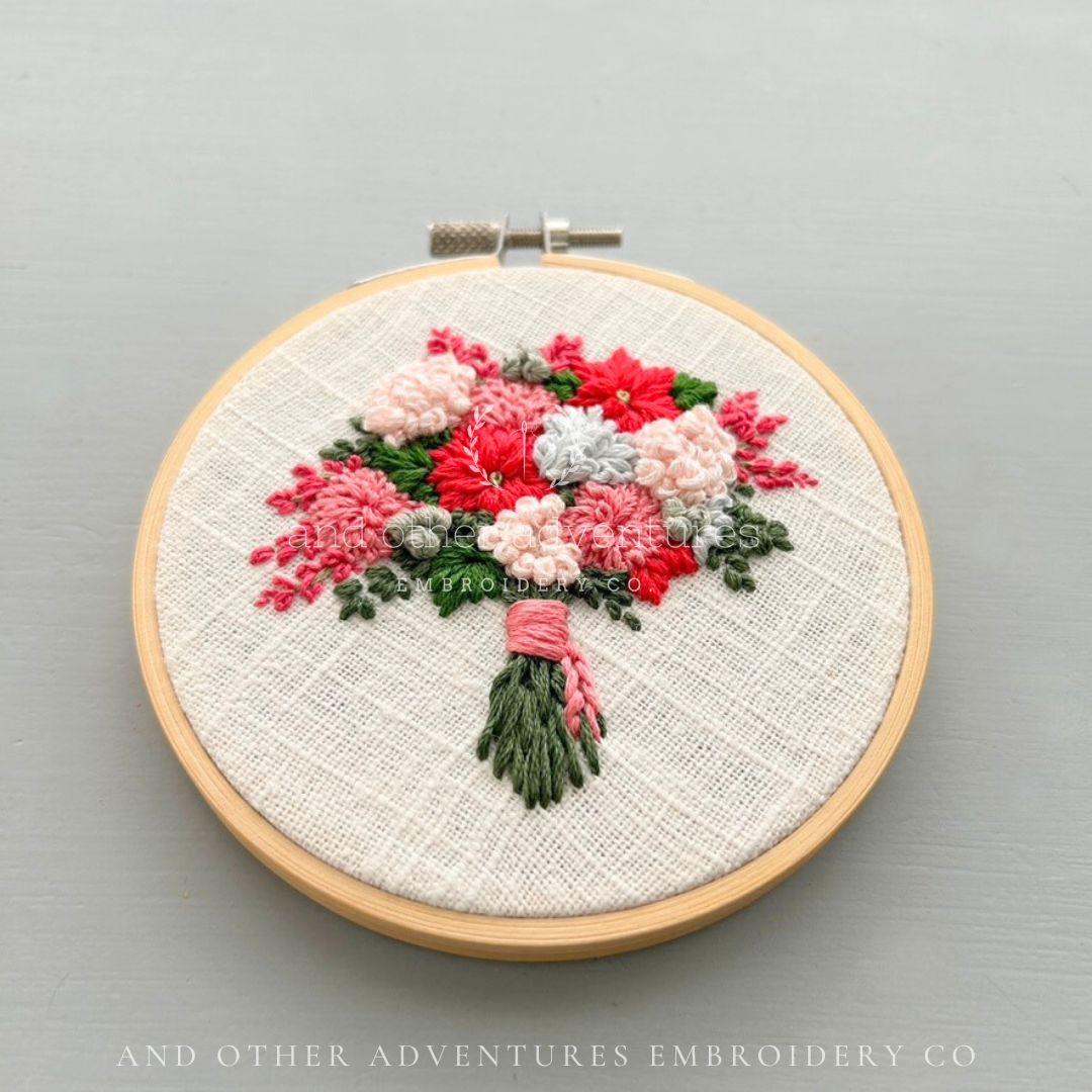 Radiant Red Poinsettia Flower bouquet art hand embroidered by And Other Adventures Embroidery Co