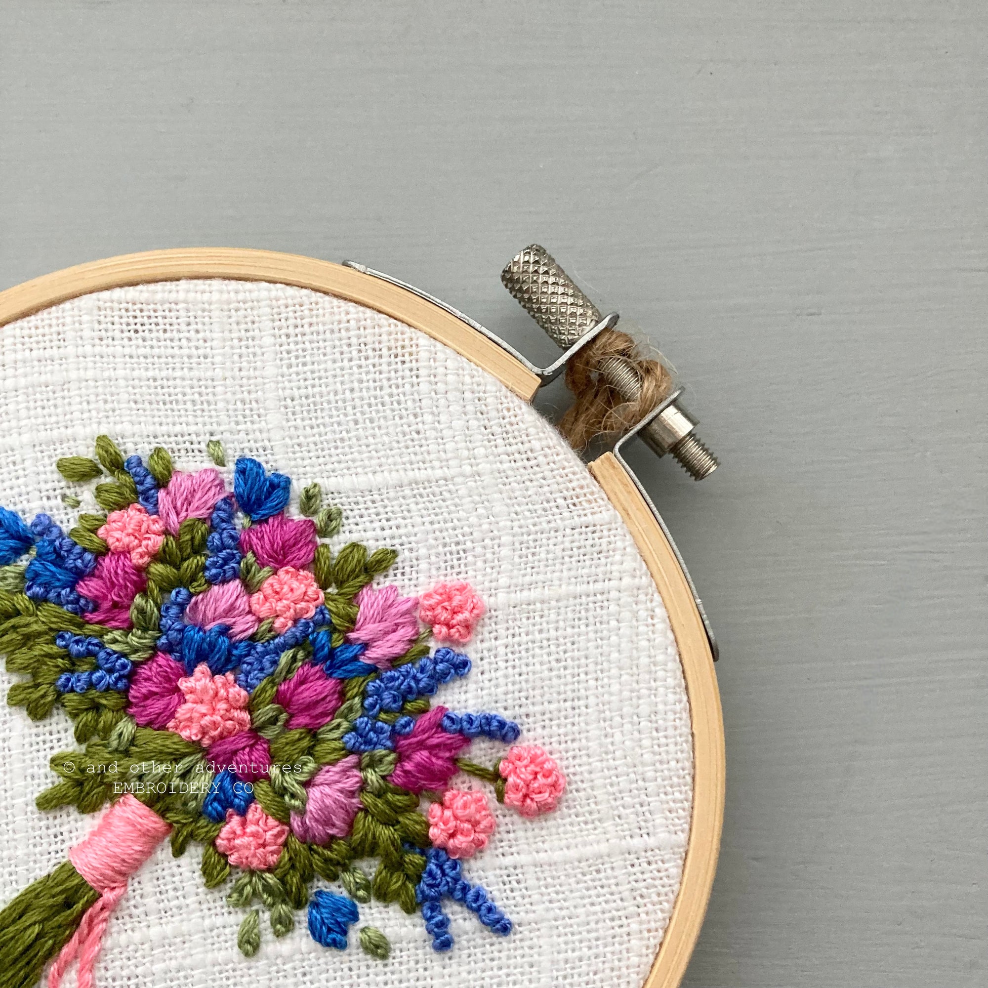Bright and beautiful hand stitched floral hoop art | And Other Adventures Embroidery Co