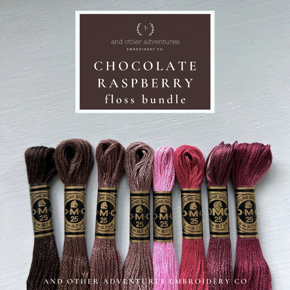 Chocolate Raspberry floss bundle with embroidery thread on a light gray background