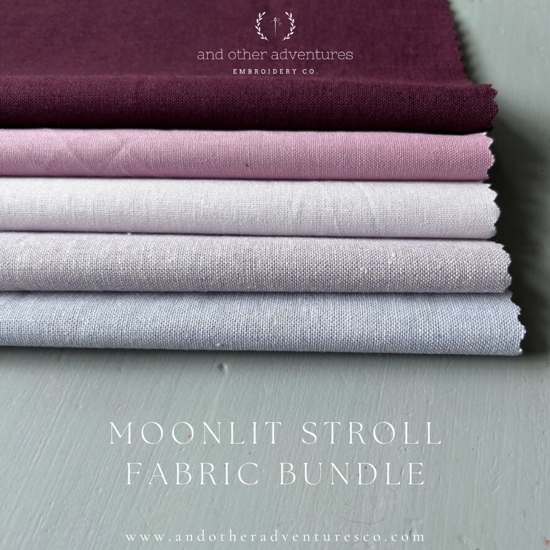 Stack of fabric swatches in purple, pink, and lilac on a light gray background with 'and other adventures embroidery co.' branding.