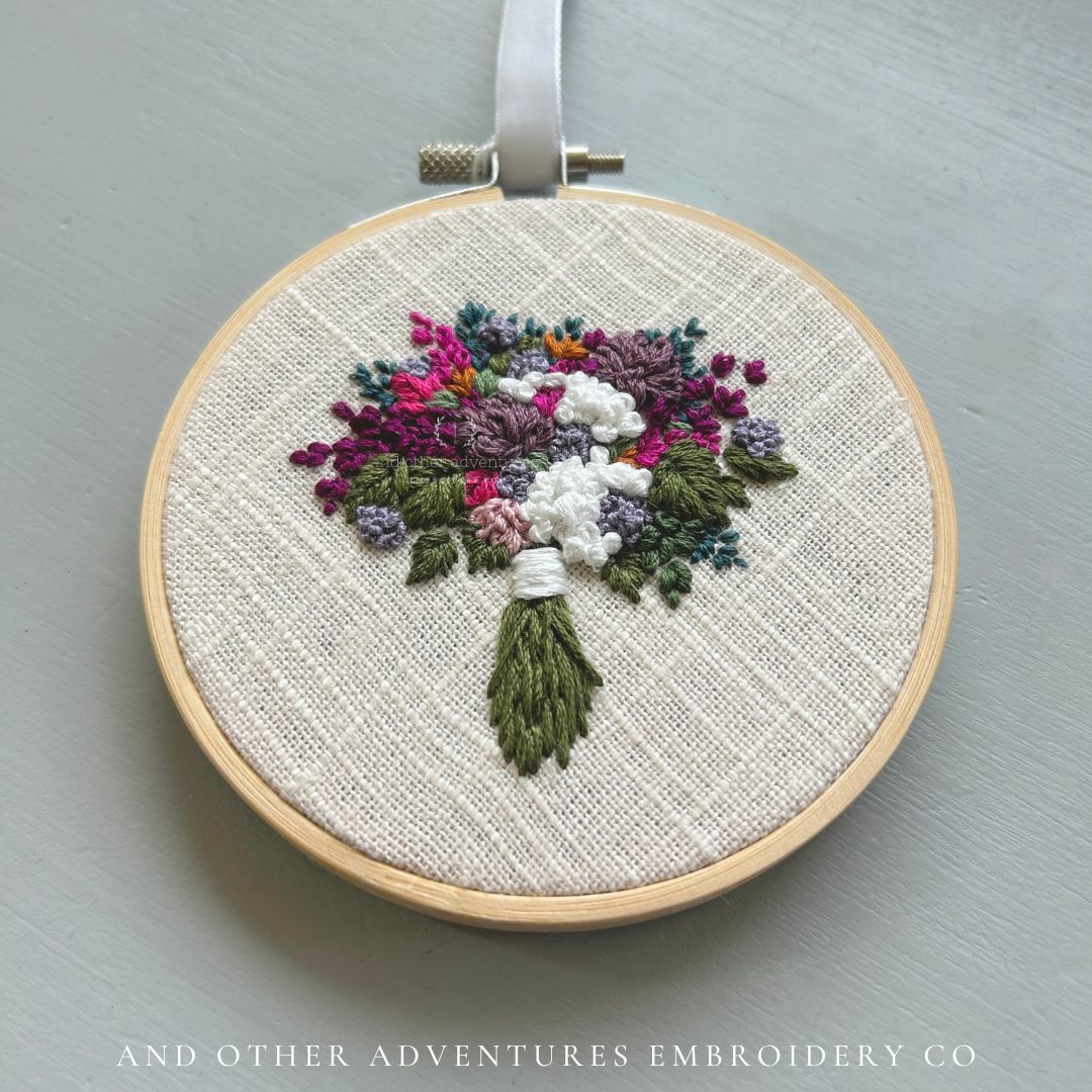 Moody hand embroidered flower bouquet in deep shades of plum, hunter green, midnight blue, mauve, and fuchsia - hand stitched by Colleen, owner and artist of And Other Adventures Embroidery Co