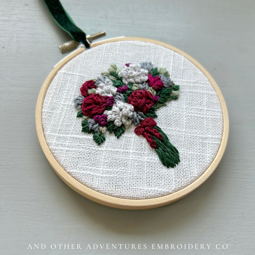 Moody winter bouquet art - hand embroidered by Colleen, owner and artist of And Other Adventures Embroidery Co