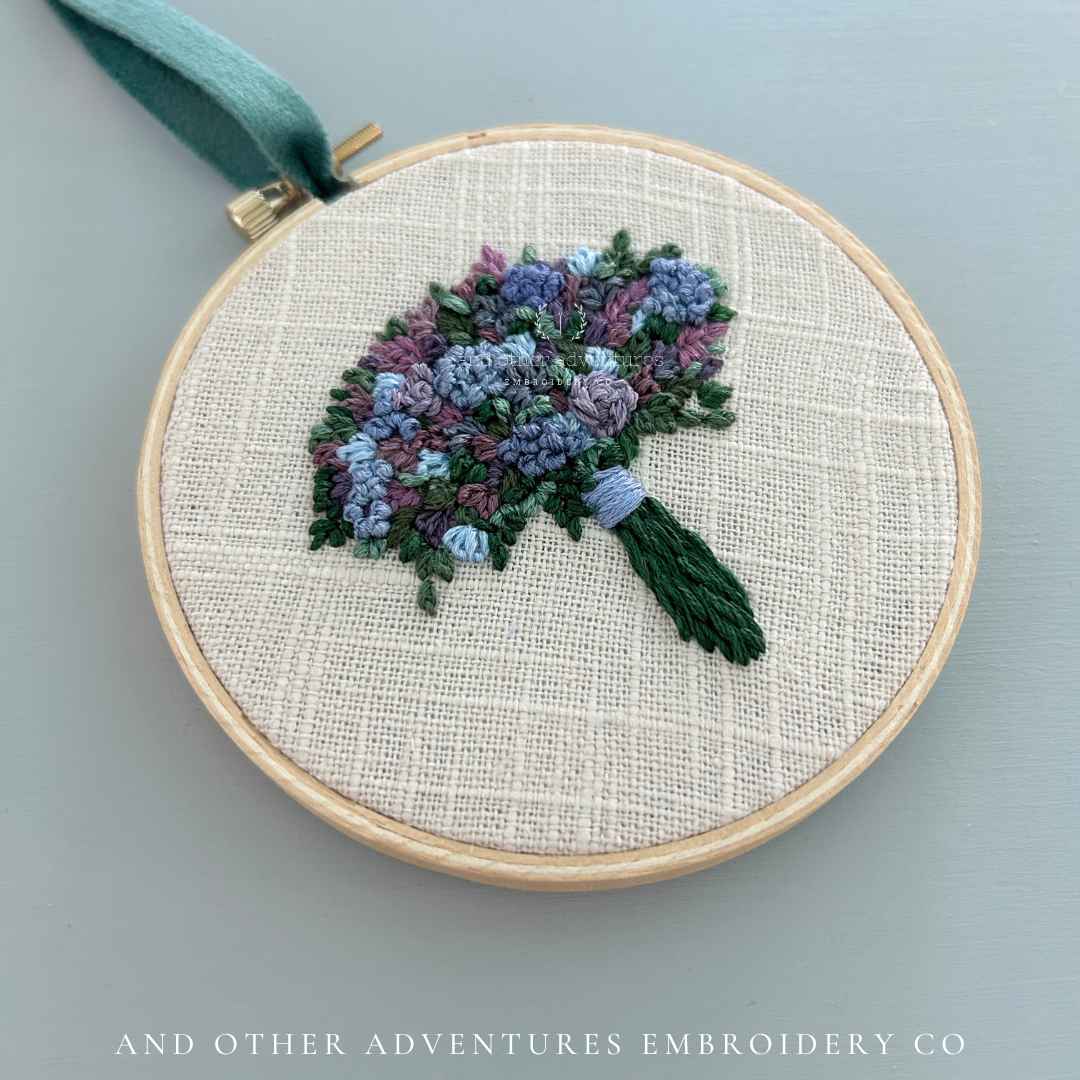 Moody Blue, Purple and green hand embroidered bouquet art hand stitched by Colleen, the owner of And Other Adventures Embroidery Co
