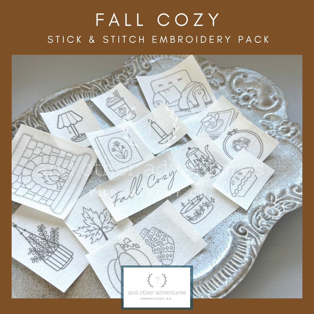 Collection of stick and stitch embroidery patterns on a decorative tray with 'Fall Cozy' text.