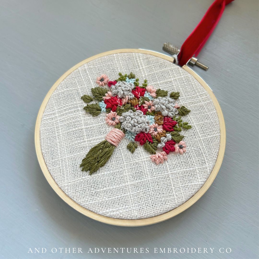 Floral Bouquet with colors of red, mustard, aqua, peach, and olive green - stitched by And Other Adventures Embroidery Co