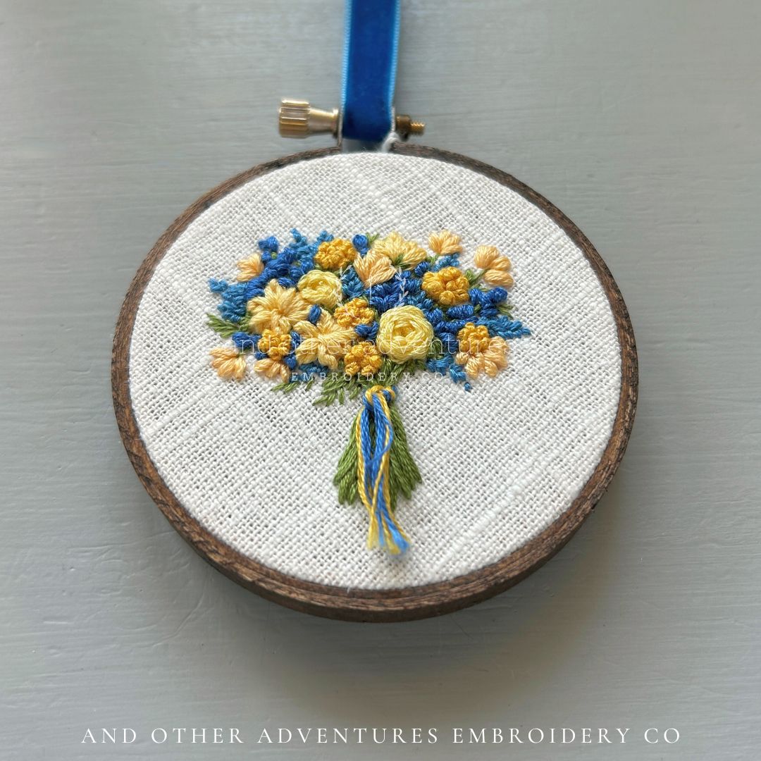 Blue and Yellow floral bouquet embroidery - solidarity with the Ukraine - hand stitched by And Other Adventures Embroidery Co. All proceeds will go the Ukrainian Red Cross Society.