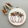 Spooky Pumpkin Embroidery Hoop Art project for beginners by And Other Adventures Embroidery Co