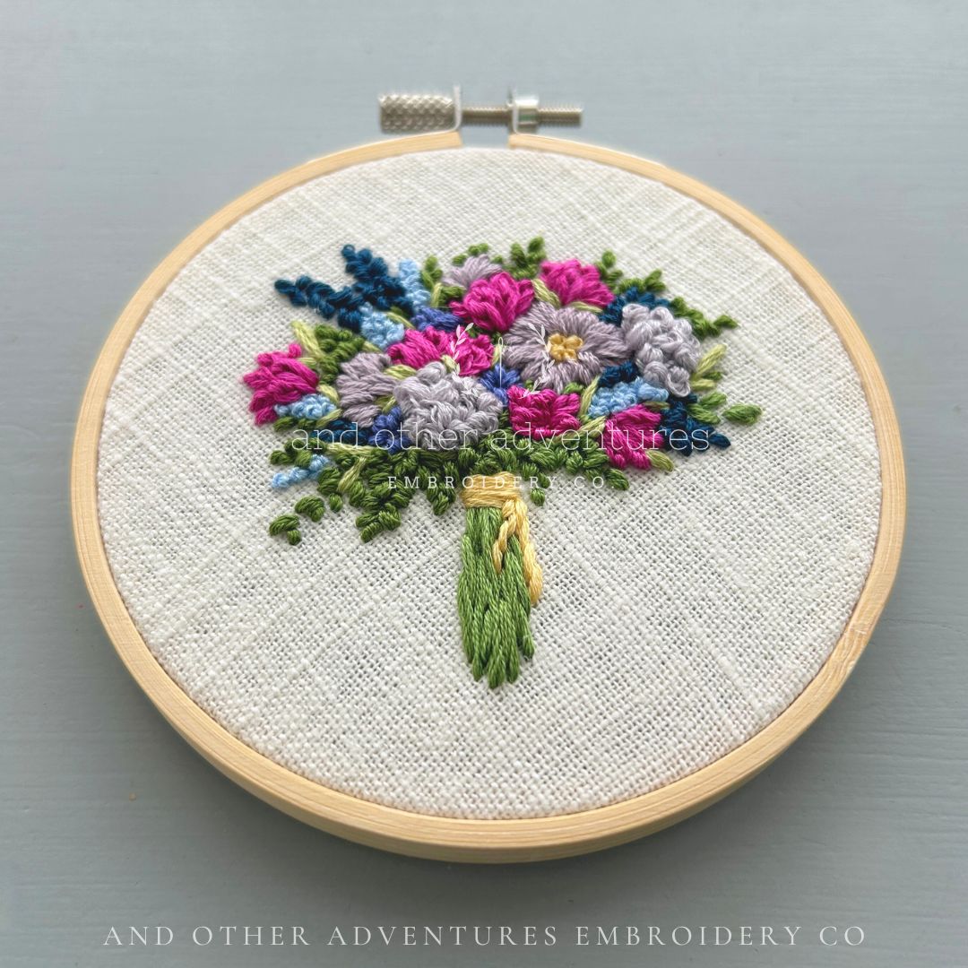 Colorful fuchsia and navy blue flower bouquet hand stitched by And Other Adventures Embroidery Co