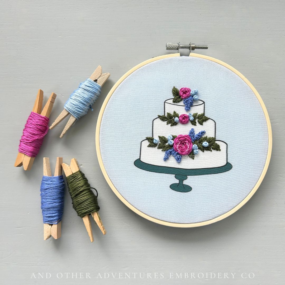 Magenta and Cobalt wedding cake hand embroidery project by And Other Adventures Embroidery Co