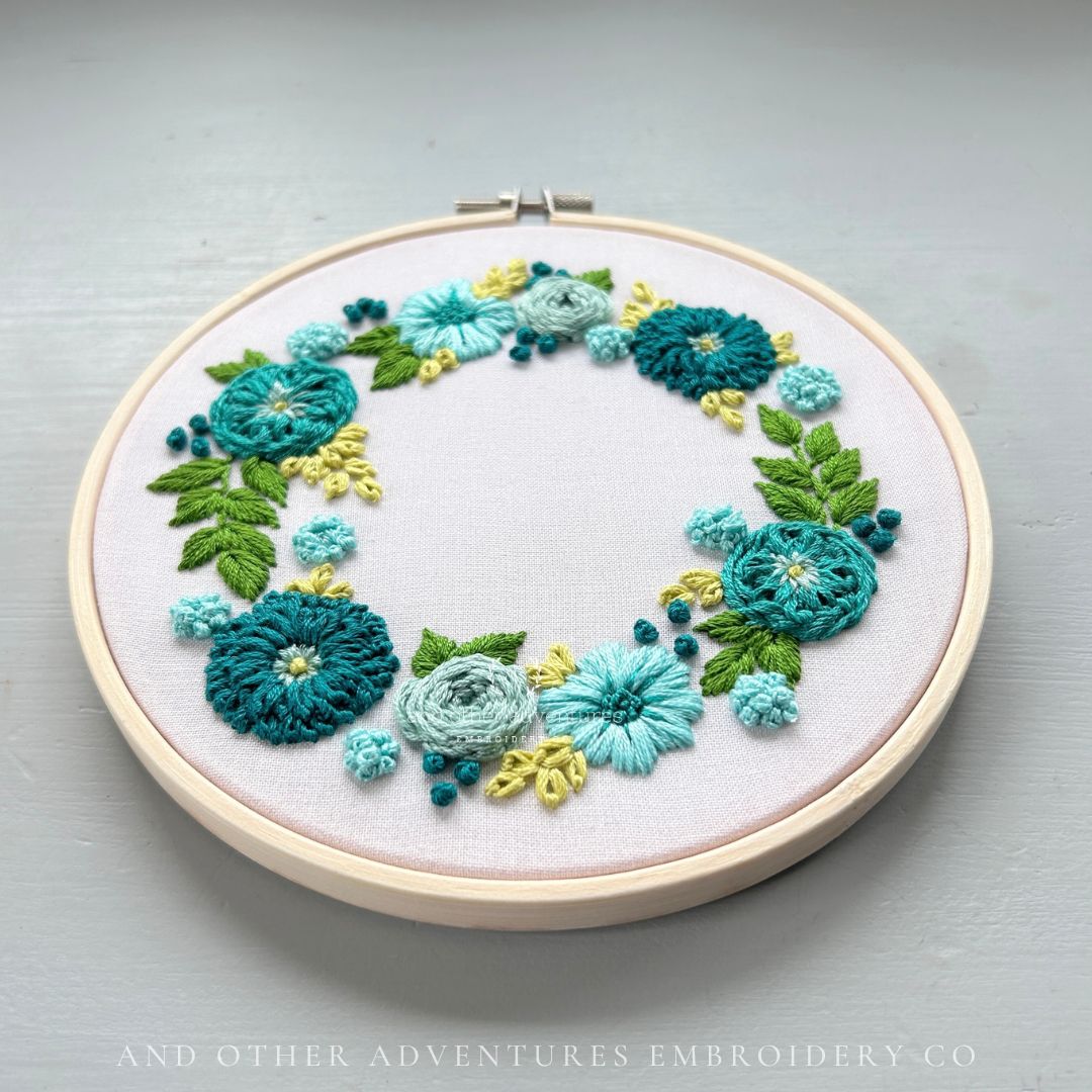 Turquoise floral wreath embroidery kit by And Other Adventures Embroidery Co