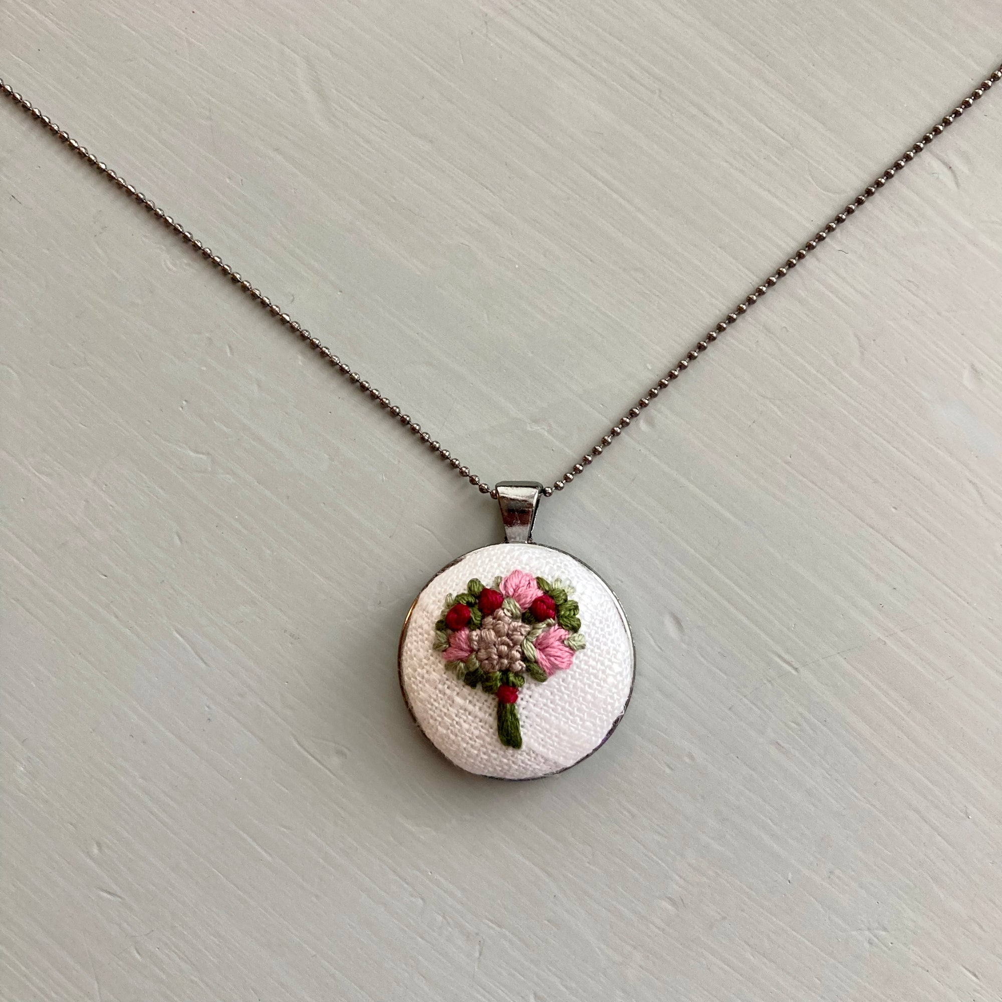 hand embroidered floral necklace for the modern romantic by And Other Adventures Embroidery Co