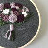 Moody and romantic embroidered floral bouquet by And Other Adventures Embroidery Co