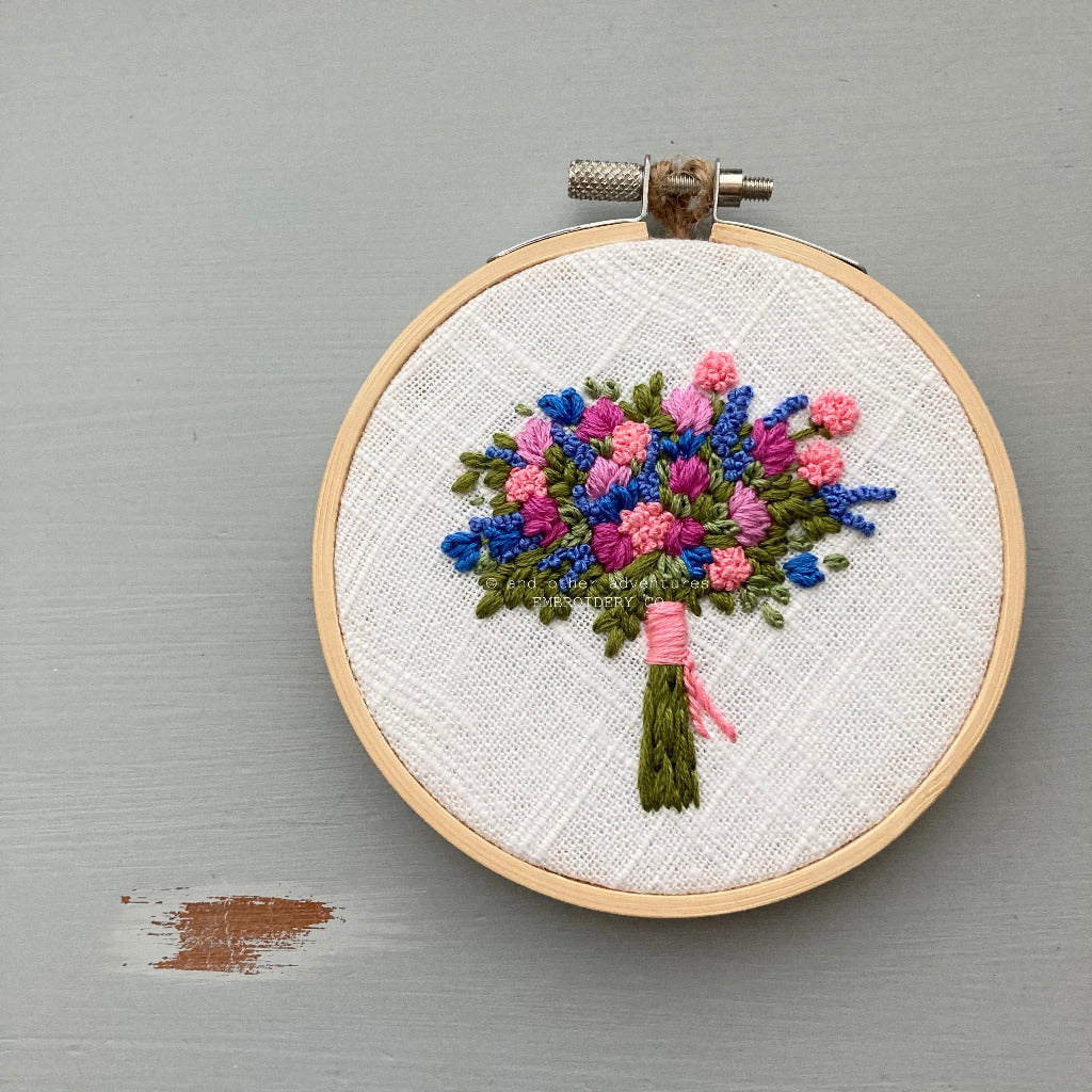 Vibrant blue and pink hand embroidered floral bouquet art | And Other Adventures Embroidery Co