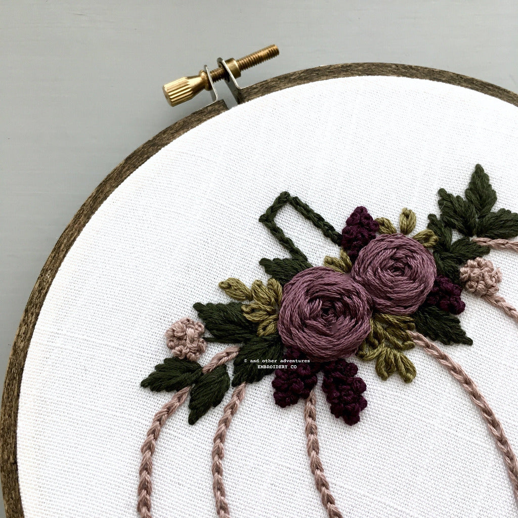 Hand Embroidered Floral Details in Halloween Colors | And Other Adventures Embroidery Co