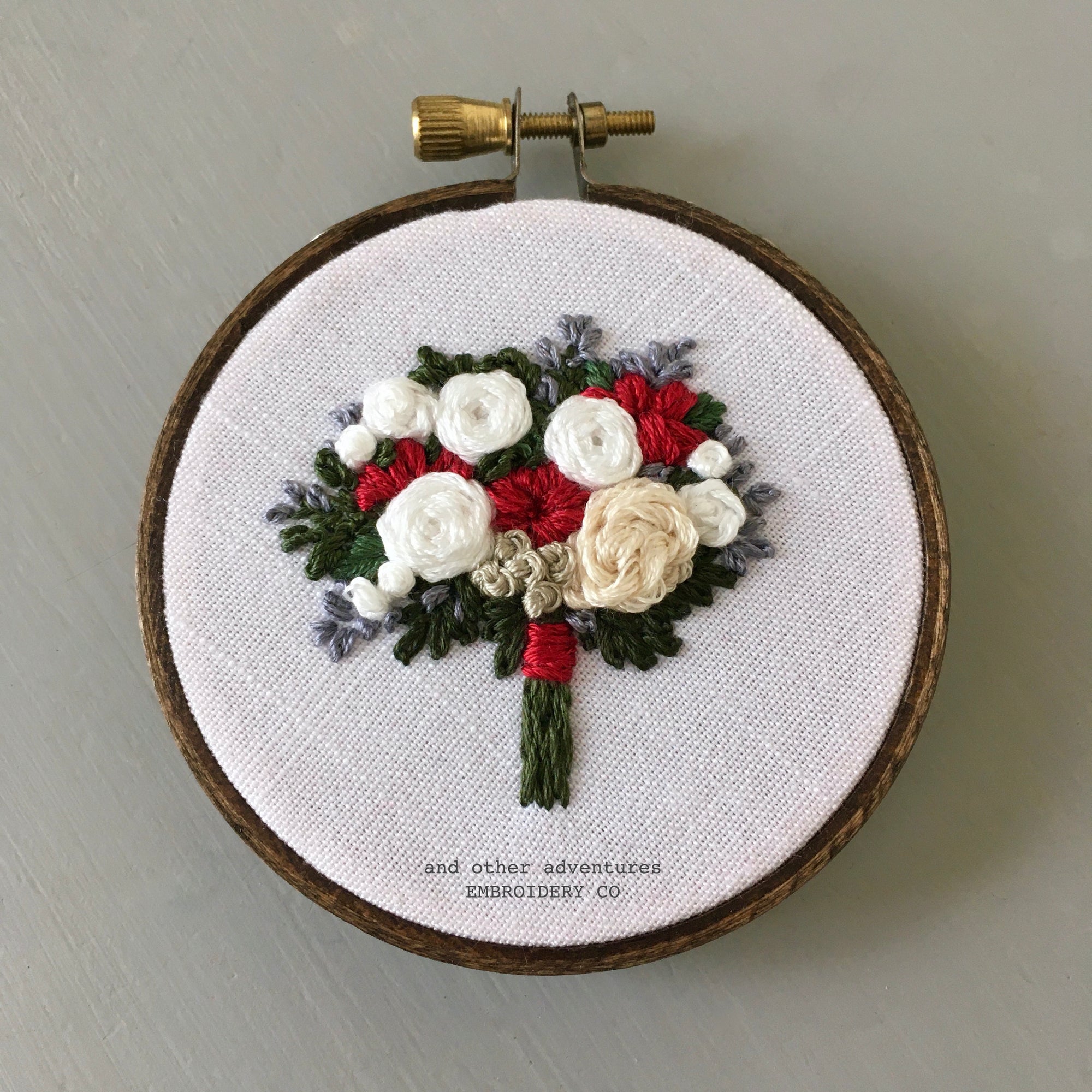 embroidered winter bouquet hoop art by And Other Adventures Embroidery Co