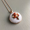 hand embroidered necklace by And Other Adventures Embroidery Co