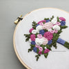 Floral Bouquet Embroidery in shades of purple, pink and white by And Other Adventures Embroidery Co