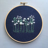 Embroidered flowers on navy