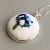 blue embroidered necklace